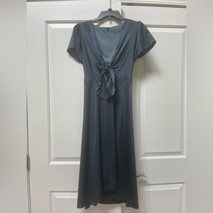 Beautiful midnight blue, soft satin, worn once, cute knot tie on front